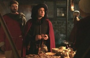 Mittelalterlicher Händler am Lebkuchenstand (Standbild aus Imagefilm)